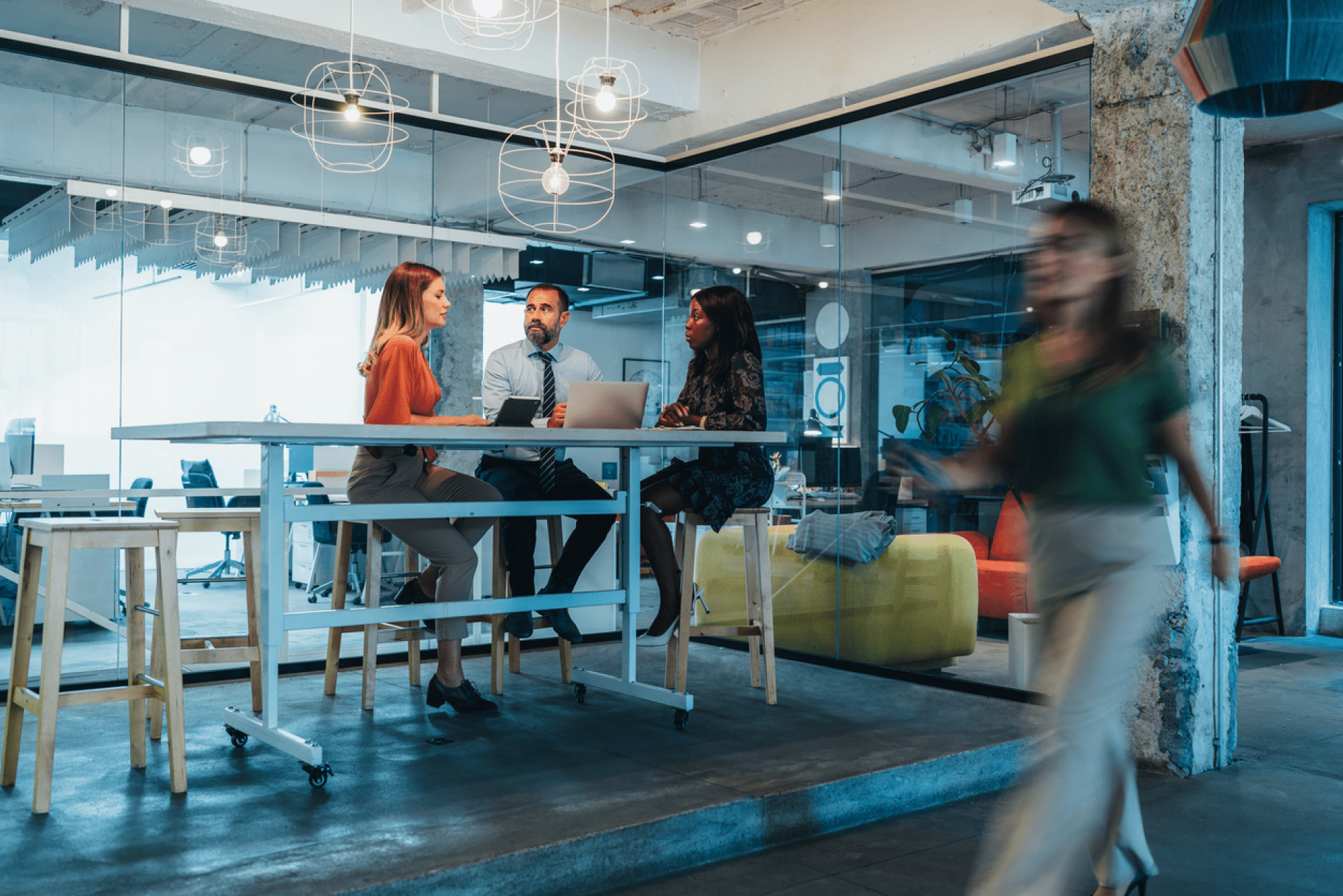 people talking at a desk